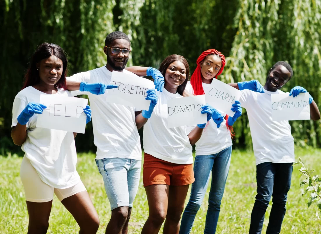 group-happy-african-volunteers-hold-blank-board-park-africa-volunteering-charity-people-ecology-concept